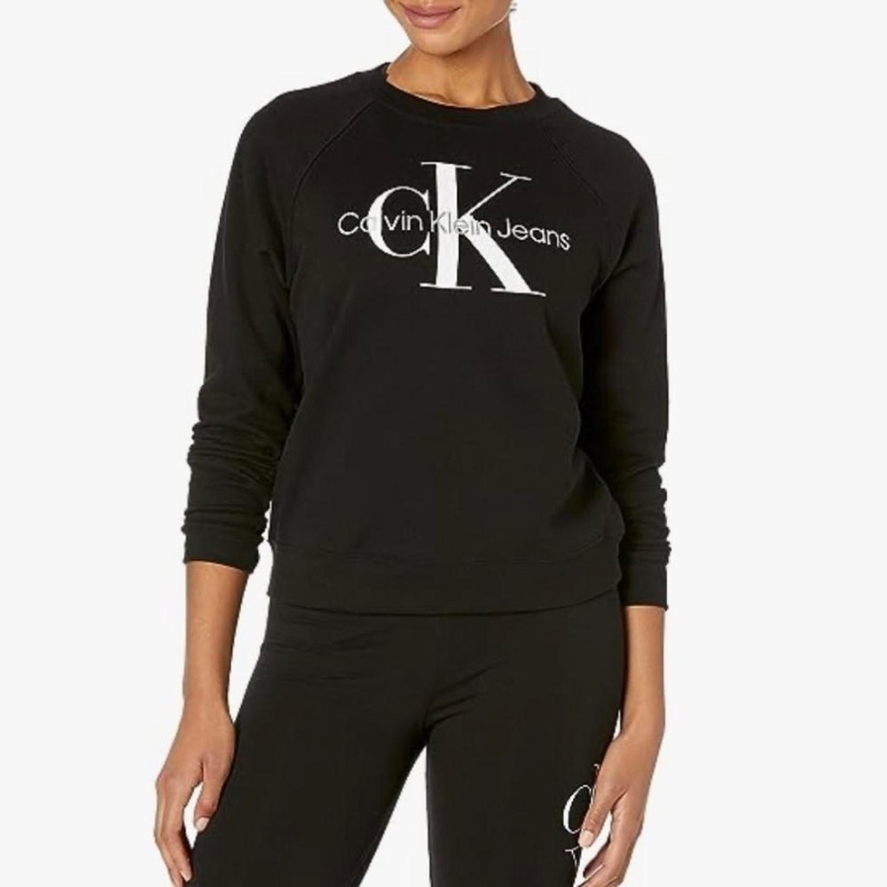 Calvin Klein women’s jeans long sleeve crew neck pullover.